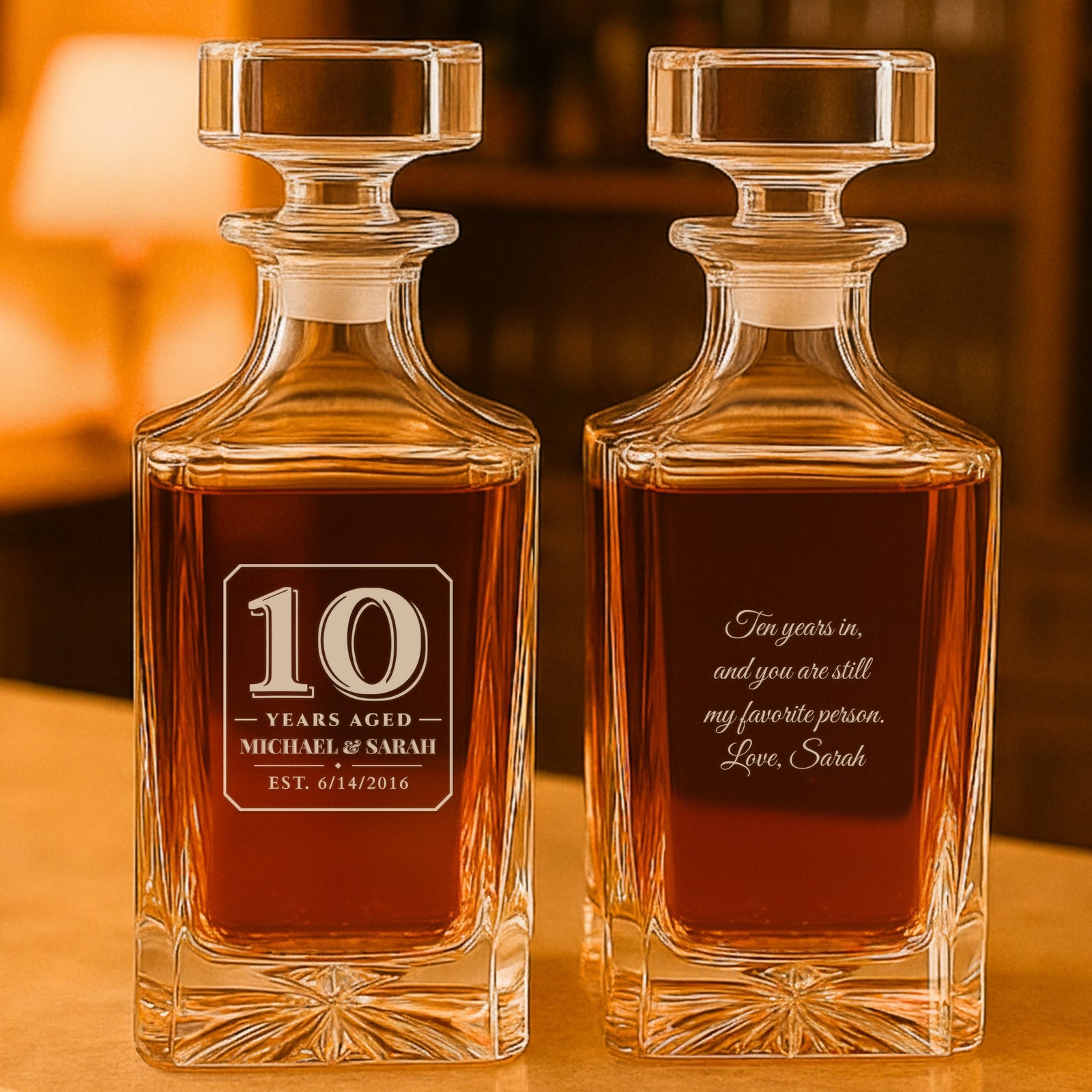 Engraved whiskey decanter reading 10 Years Aged, Michael & Sarah, est. 6/14/2016, beside its back message, a 10 year anniversary gift for him
