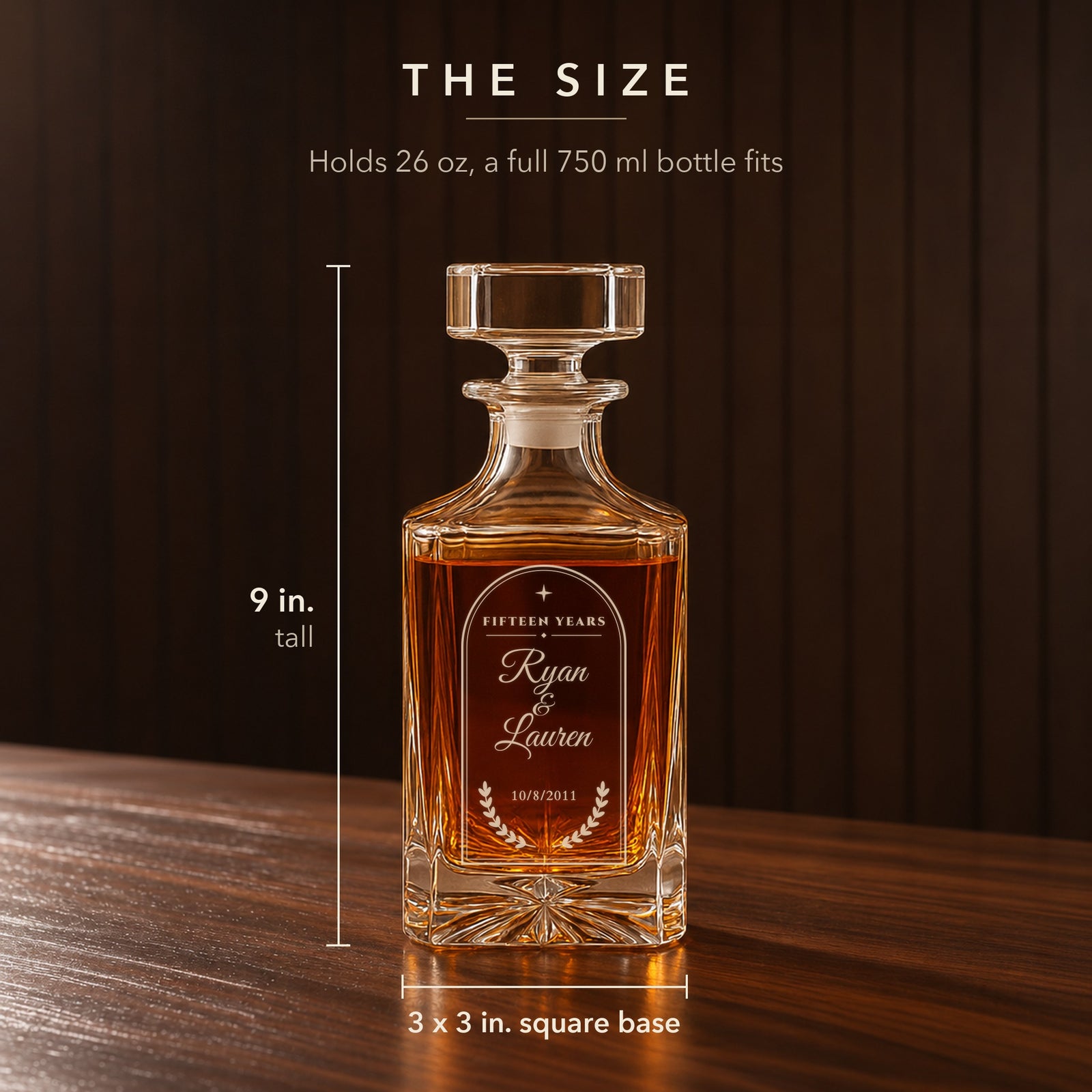 Size of the personalized 15th anniversary whiskey decanter: 9 inches tall with a 3 x 3 inch square base, holds 26 oz so a full 750 ml bottle fits