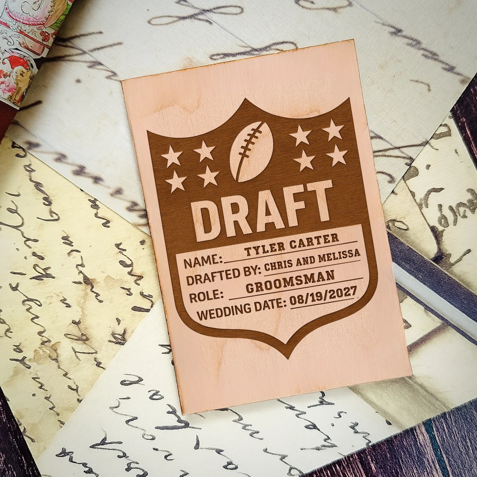 Custom wooden football groomsmen proposal card with engraved name and wedding details
