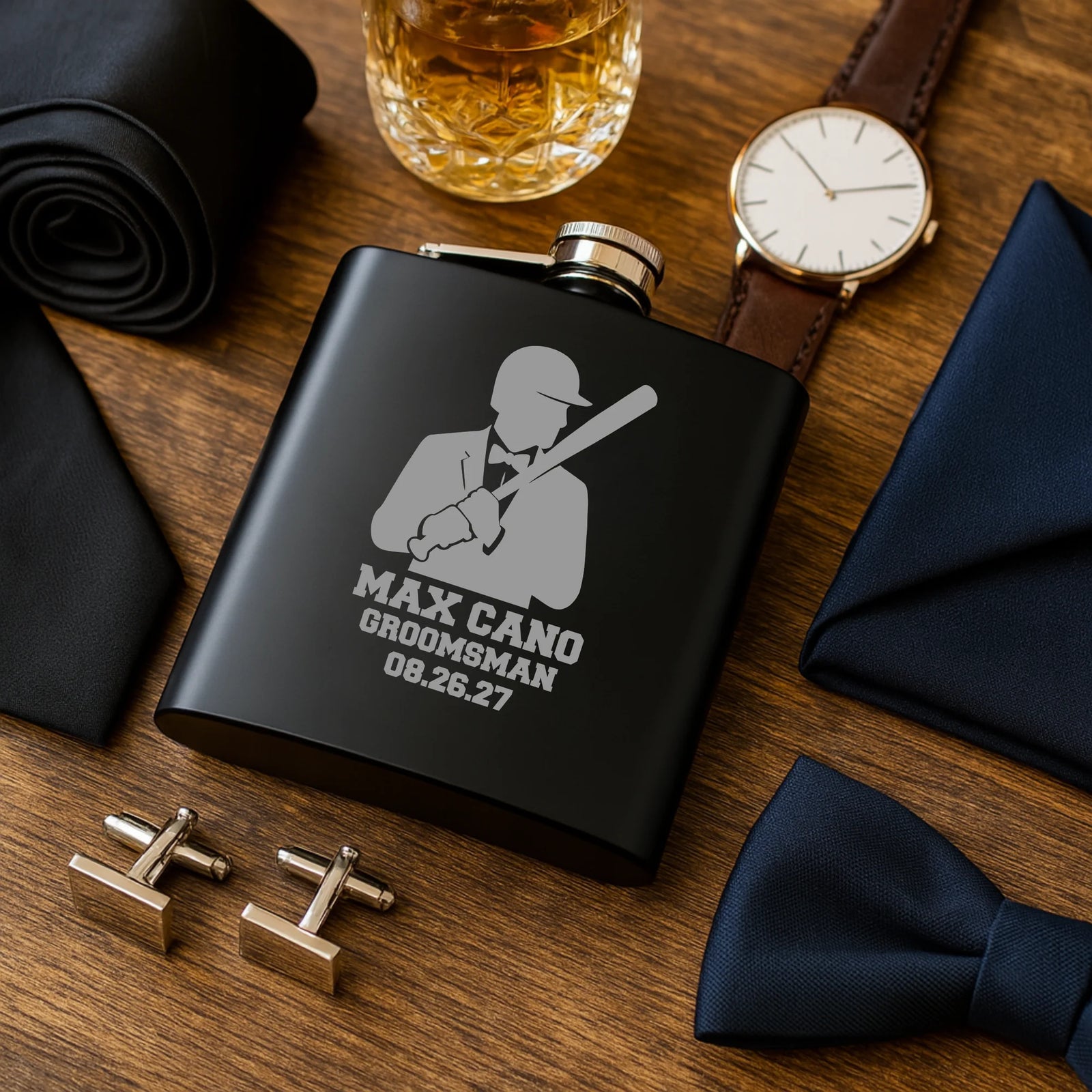 Matte black personalized groomsmen flask with engraved name, wedding role, date, and baseball silhouette design