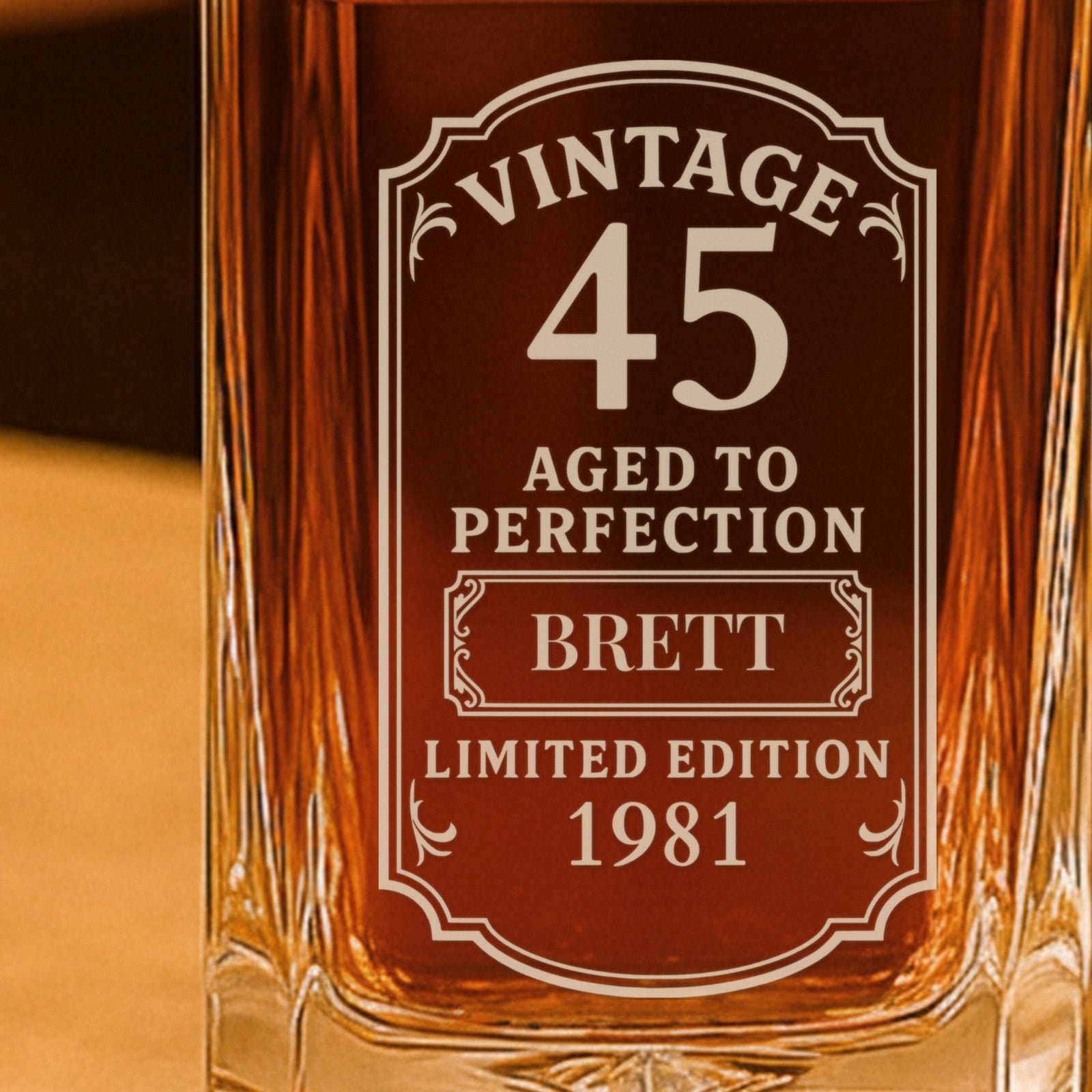 Close-up of the Vintage 45 Aged to Perfection label engraved with the name BRETT and 1981, a unique 45th birthday idea for him