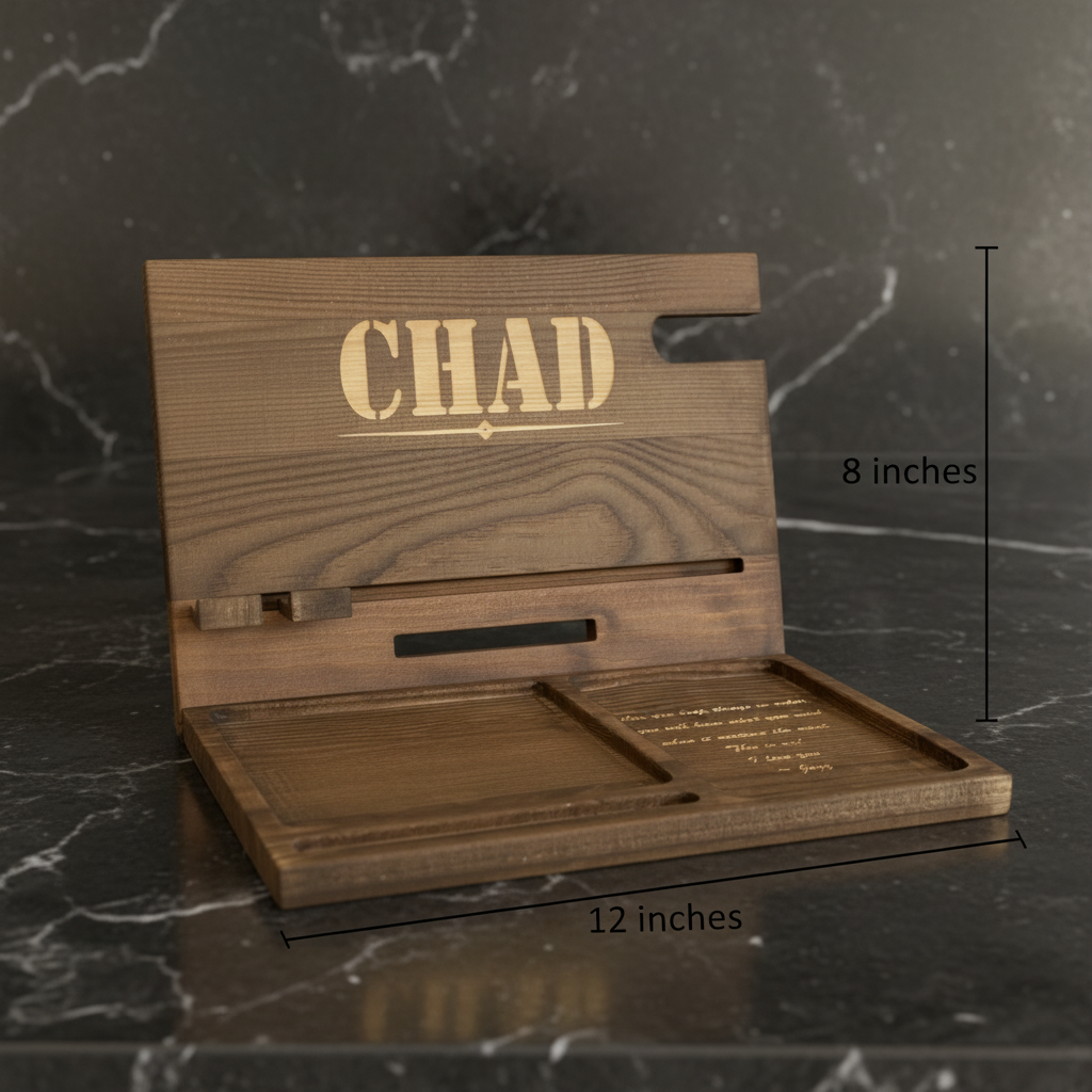 Wooden charging dock with sample name "CHAD" engraved in gold lettering, featuring compartments for phone, watch, and accessories, measuring 12 by 8 inches