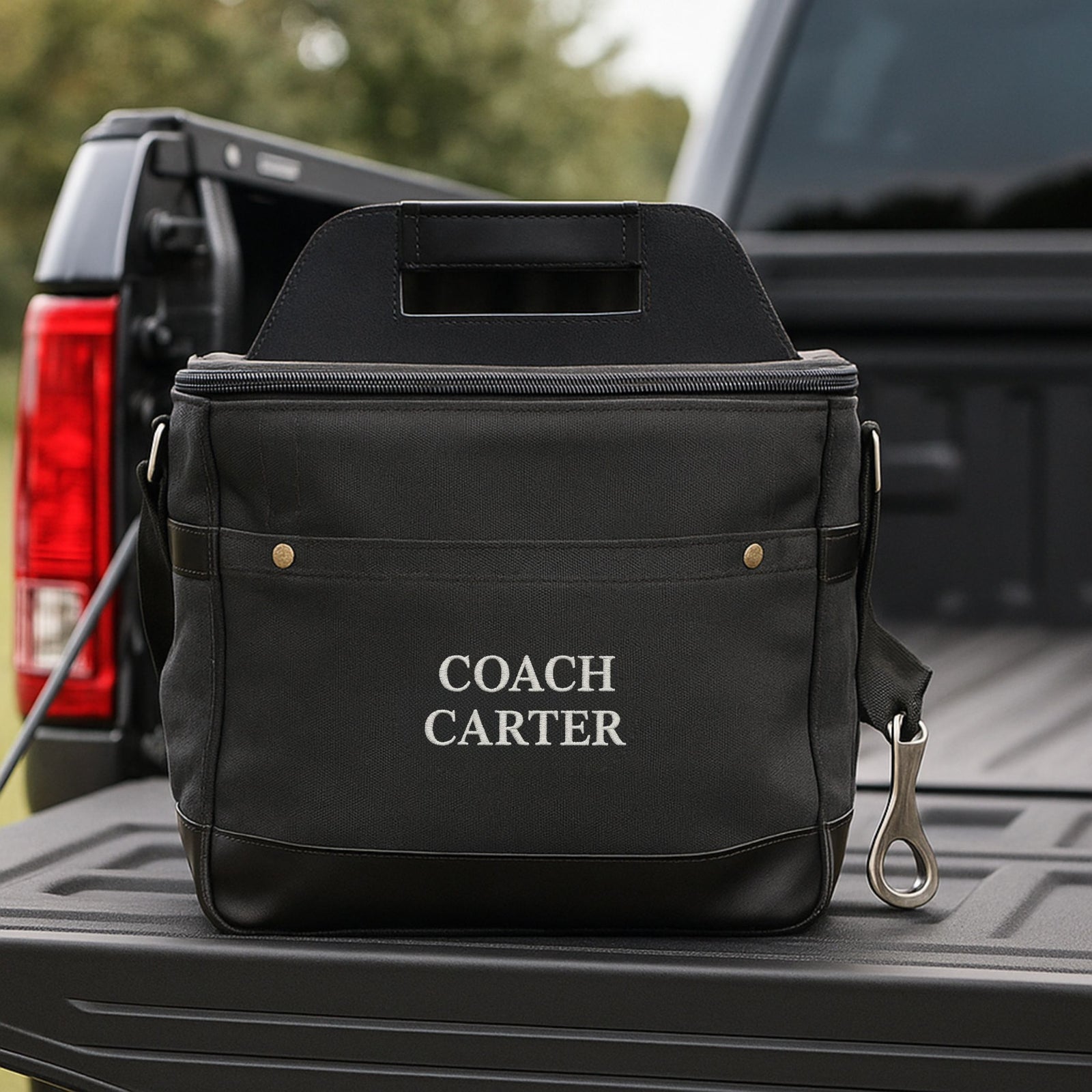 Custom insulated cooler bag for soccer coach with personalized name and durable handle on kitchen counter