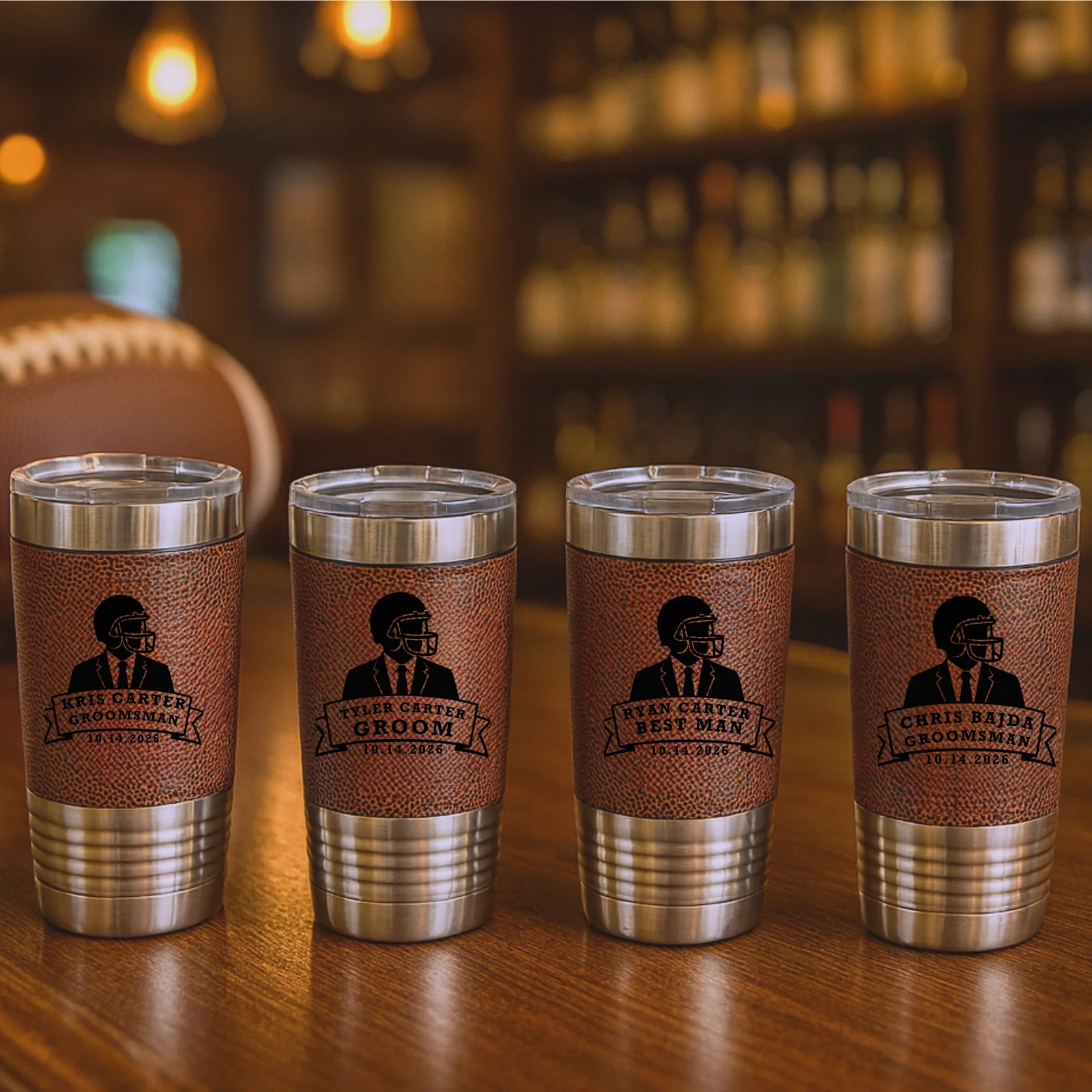 Personalized football tumbler with engraved name, groomsman role, and wedding date on faux leather wrap