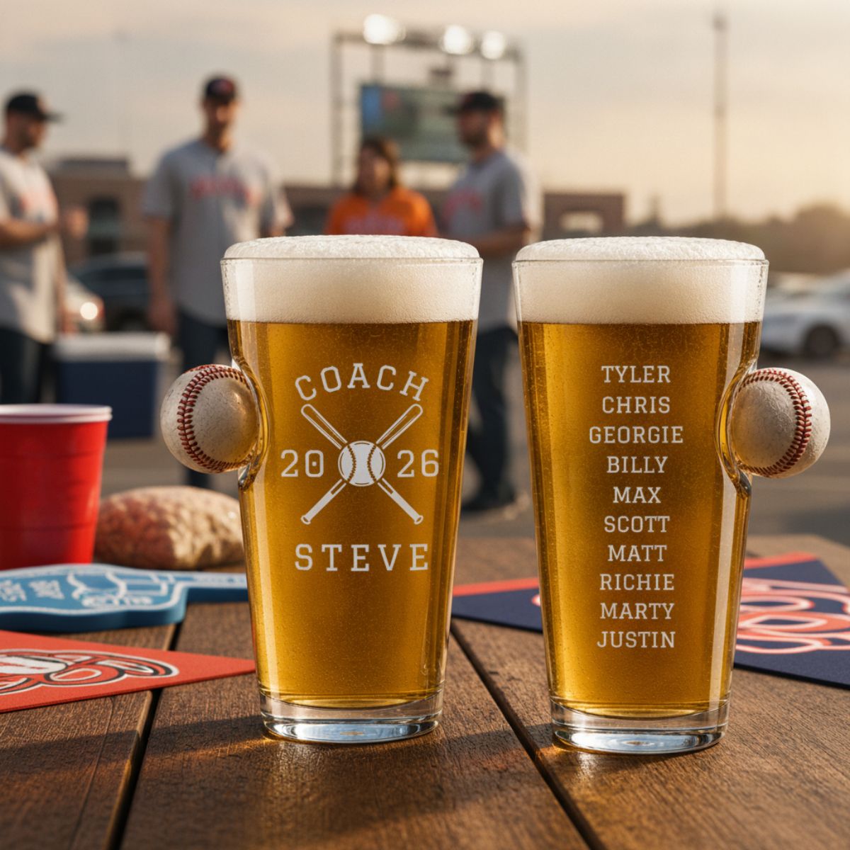 Personalized baseball coach gift pint glass engraved with crossed bats, the word COACH, the coach's name and year, and the team's full player roster on the back.