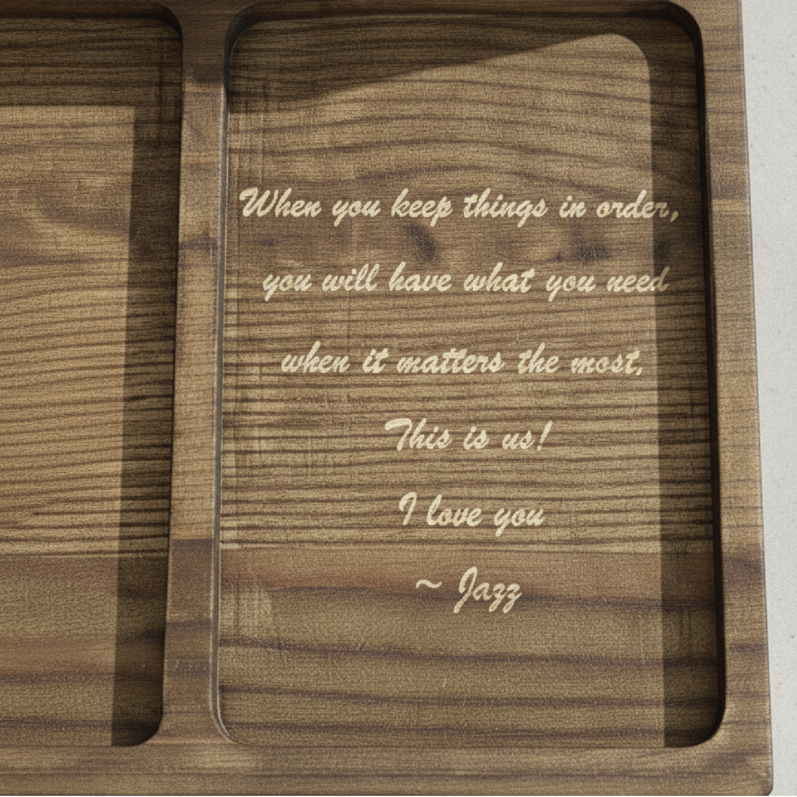 Wooden charging dock laser-engraved with sample message "When you keep things in order, you will have what you need when it matters the most. This is us! I love you ~ Jazz