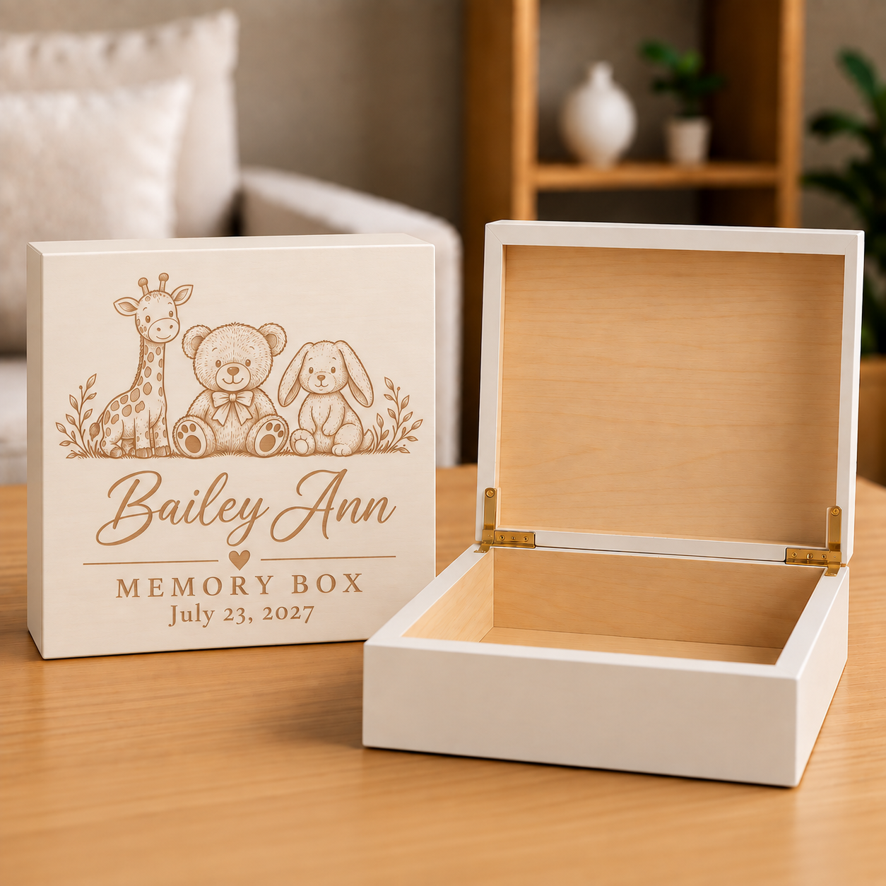White wooden memory box with engraved animals and sample personalization "Bailey Ann" and date July 23, 2027, shown closed and open with natural interior