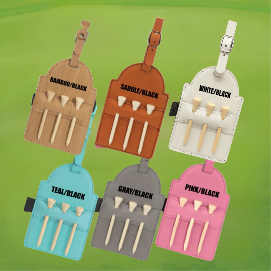 Grid display showing six golf bag tag color options: bamboo/black, saddle/black, white/black, teal/black, gray/black, and pink/black, each with wooden tee holders and leather attachment straps