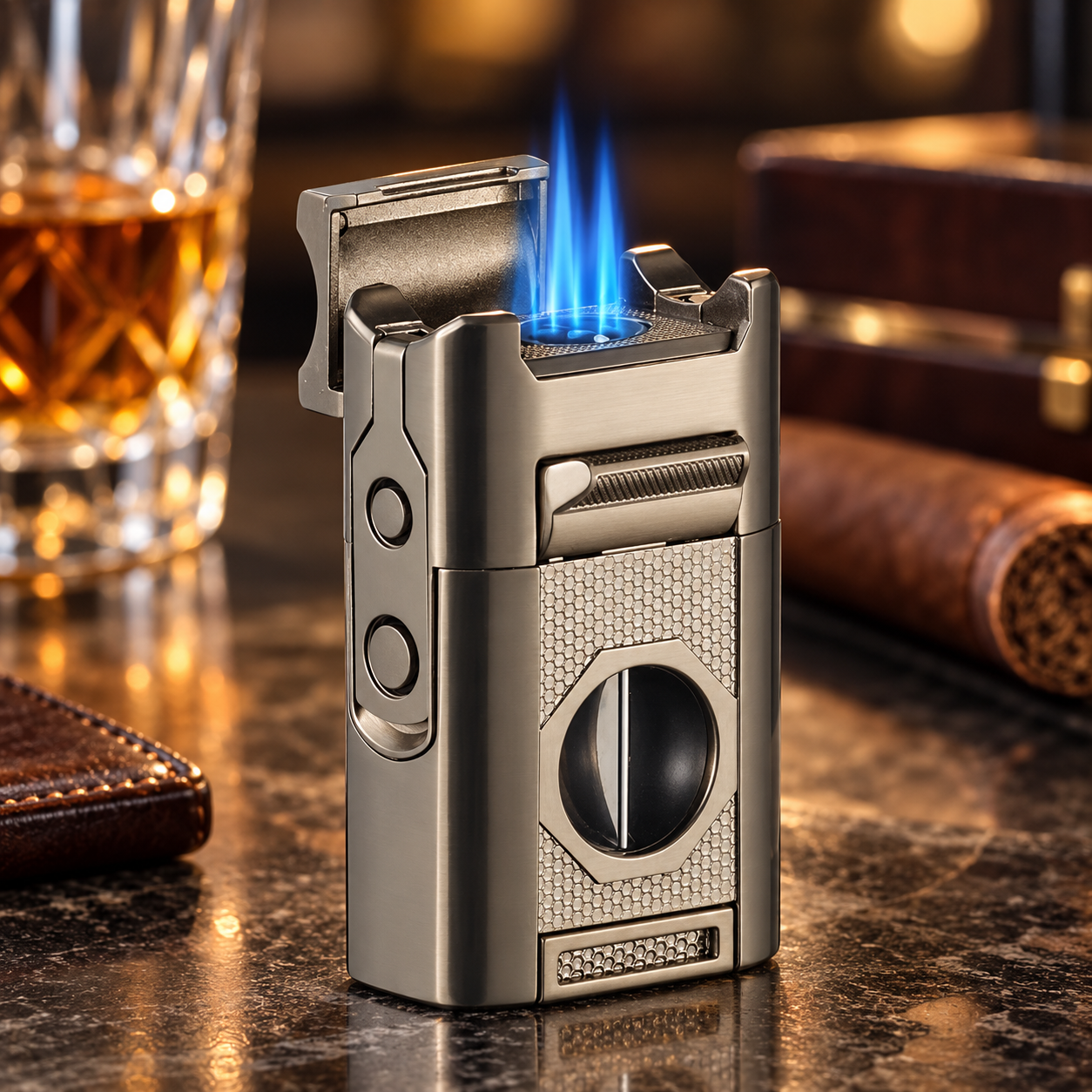 Brushed metal lighter with blue flame ignited, featuring textured grip panel and circular window detail, surrounded by whiskey glass and cigar on dark surface