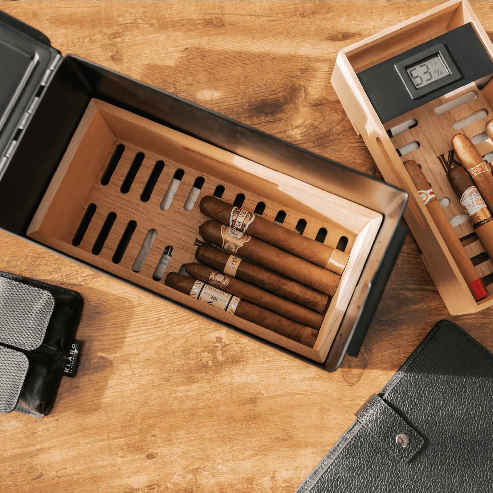 Black 50 Cal ammo can cigar humidor with Spanish cedar trays and digital hygrometer.