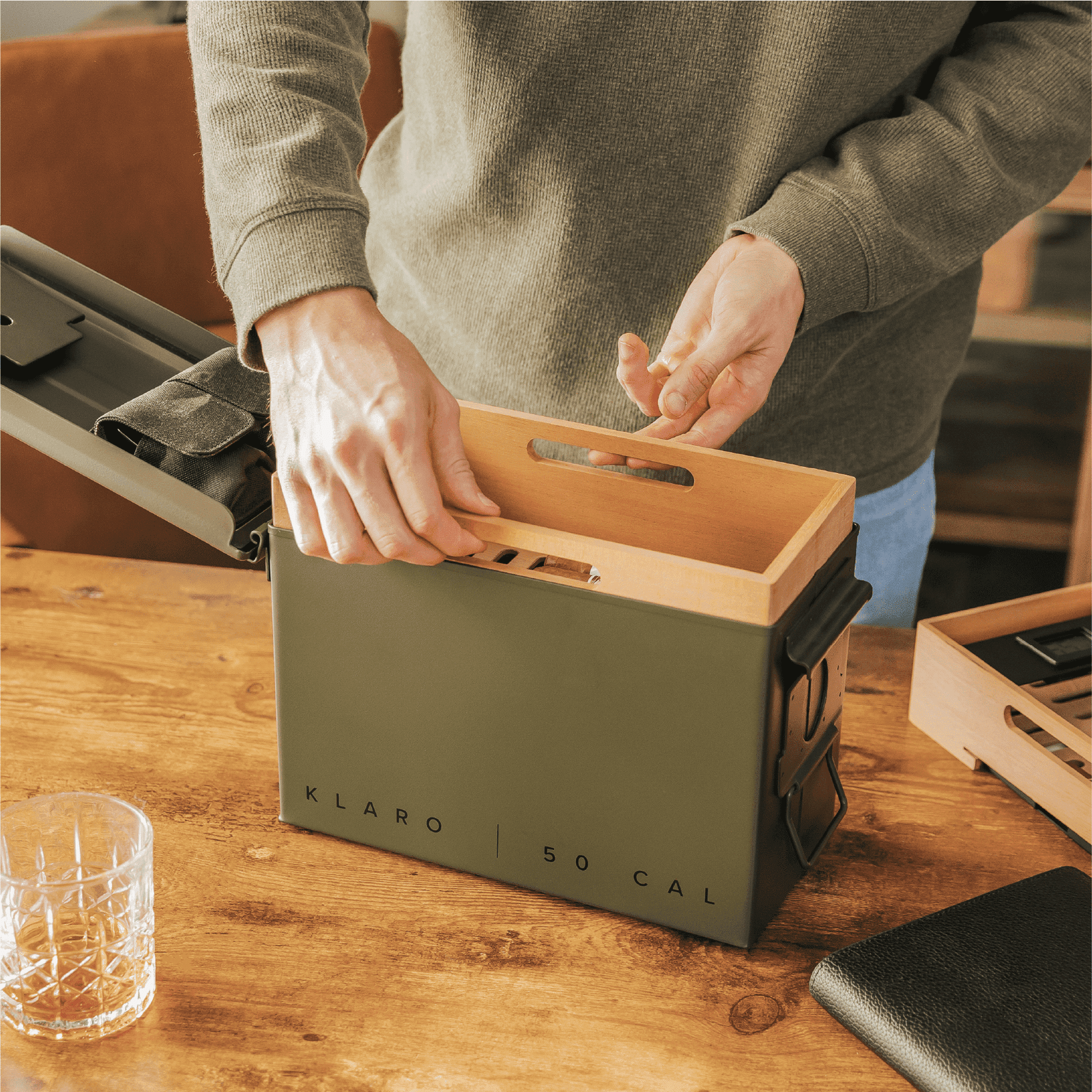 Green 50 Cal ammo can cigar humidor with Spanish cedar trays and digital hygrometer.