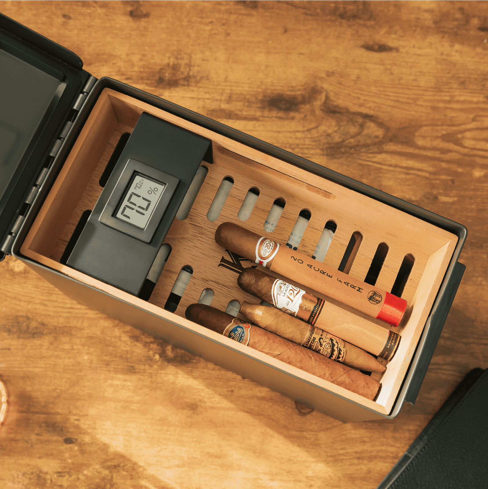 Green 50 Cal ammo can cigar humidor with Spanish cedar trays and digital hygrometer.