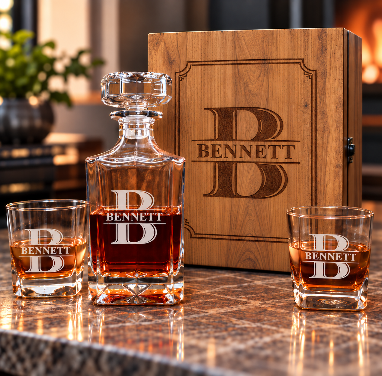 Personalized retirement decanter and two matching glasses in front of a wood gift box, all engraved with a split monogram initial B and the name Bennett