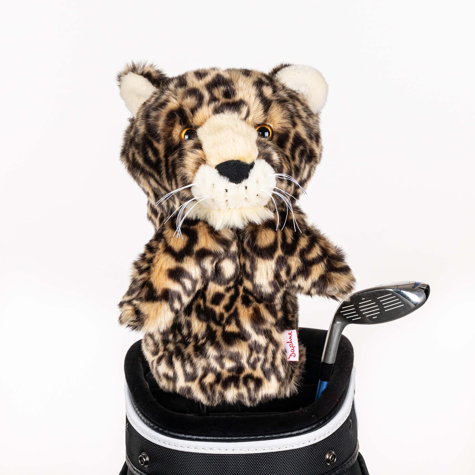 Plush leopard golf headcover covering a club in a golf bag, a standout golf gift for men from Groovy Guy Gifts