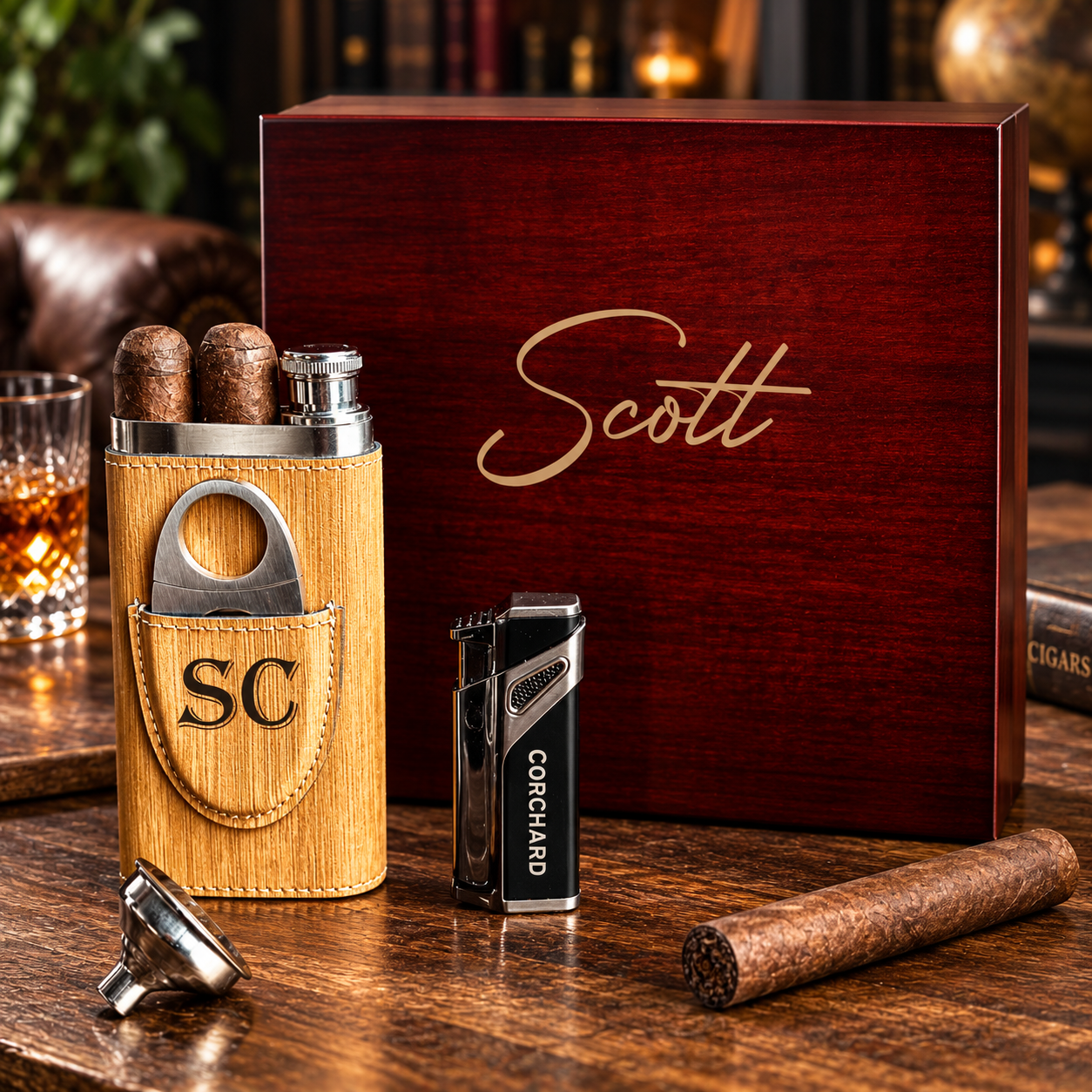 Dark wood cigar gift box with personalization sample "Scott" engraved on lid, shown with wooden cigar case engraved "SC", lighter, cigar cutter, and cigars.