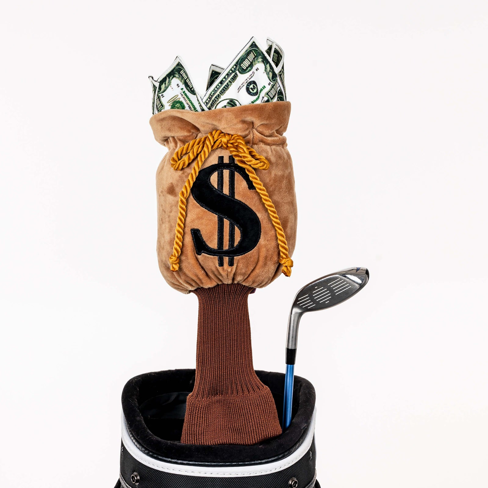 Plush money bag golf headcover covering a club in a golf bag, a standout golf gift for men from Groovy Guy Gifts