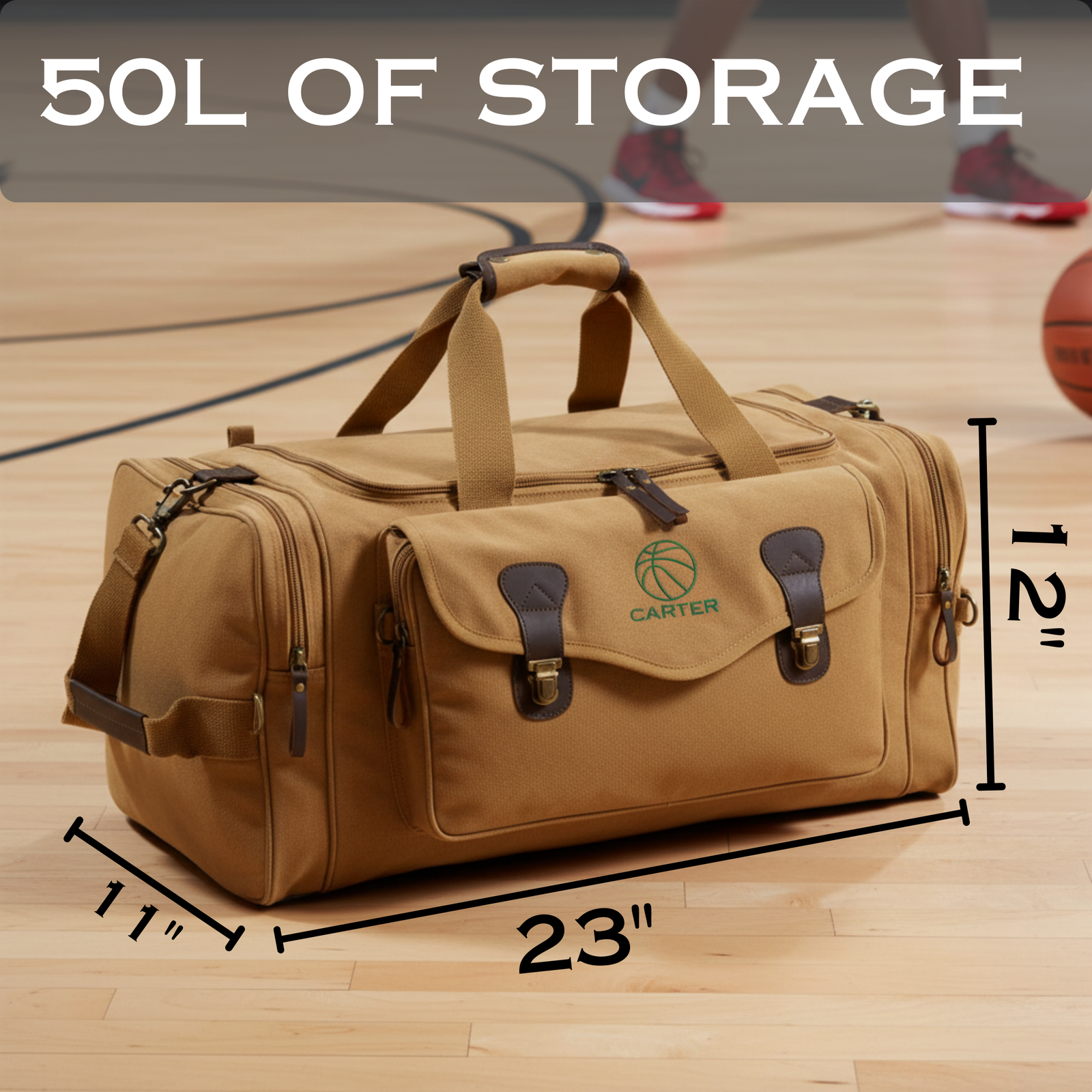 Tan canvas duffel bag with leather accents and basketball logo, displayed on wooden gym floor with dimensions marked 23" by 11" by 12