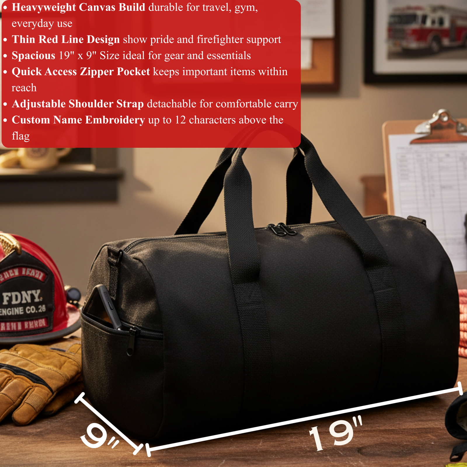 Black heavyweight canvas duffle bag with dual black shoulder straps, displayed on wooden surface with firefighter helmet and gloves nearby, showing 19" x 9" dimensions