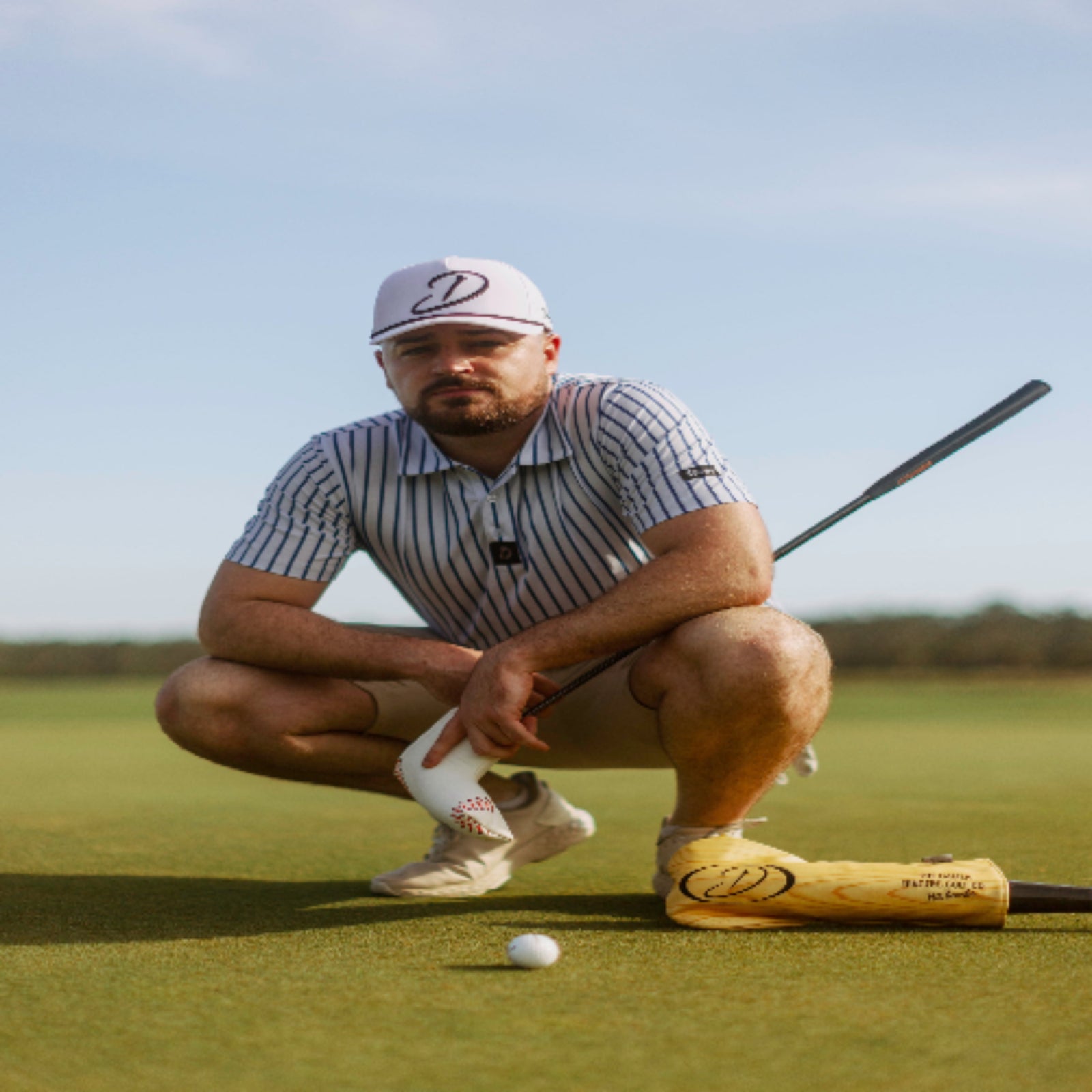 Sporty pinstripe polo blending 92% polyester with 8% spandex for stretch and breathability. Athletic fit that stays sharp and moves with you.