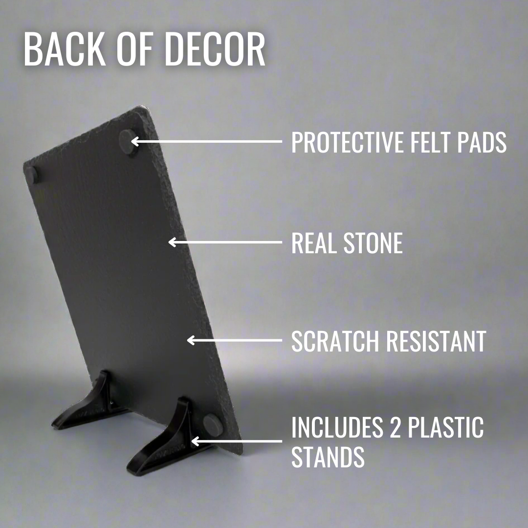 Back view of black slate plaque showing protective felt pads, scratch-resistant stone surface, and two included plastic display stands
