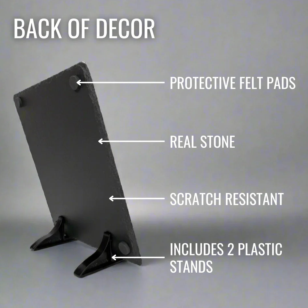 Dark slate memorial plaque shown from back, displaying protective felt pads, real stone construction, scratch-resistant surface, and two included plastic display stands