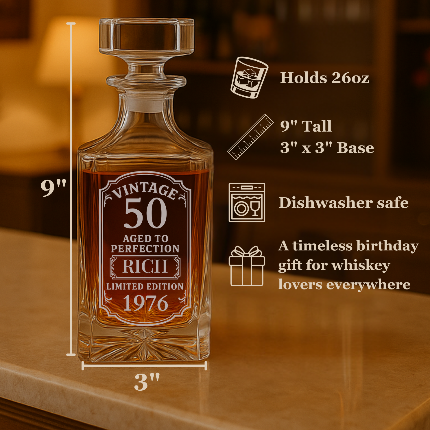 Engraved whiskey decanter with sample "Vintage 50 Aged to Perfection" label, 9 inches tall, 26oz capacity, shown with specification details and warm background lighting.