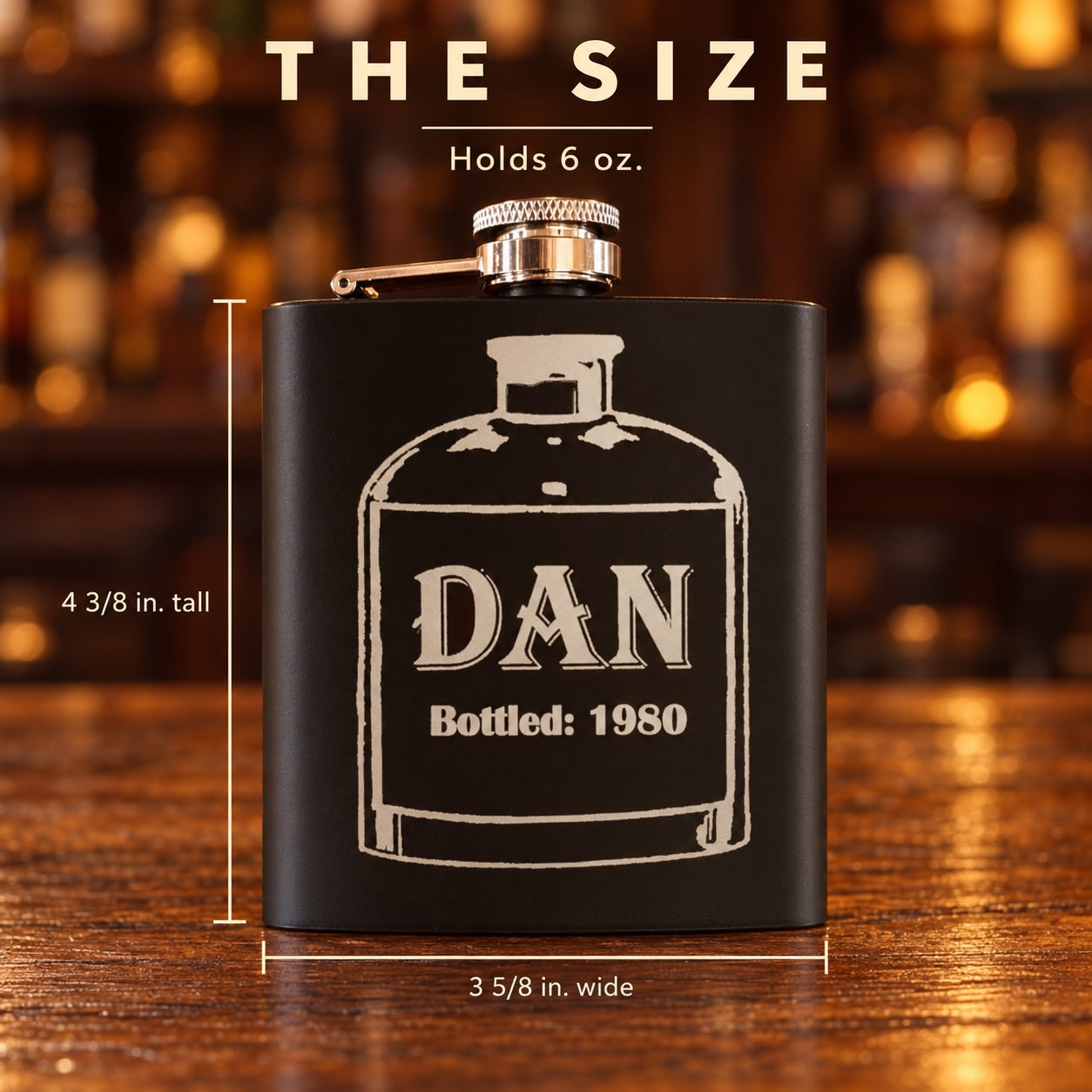 Size of the engraved birthday flask, 4 3/8 inches tall and 3 5/8 inches wide and holding 6 oz, with DAN and Bottled: 1980 on the bottle label
