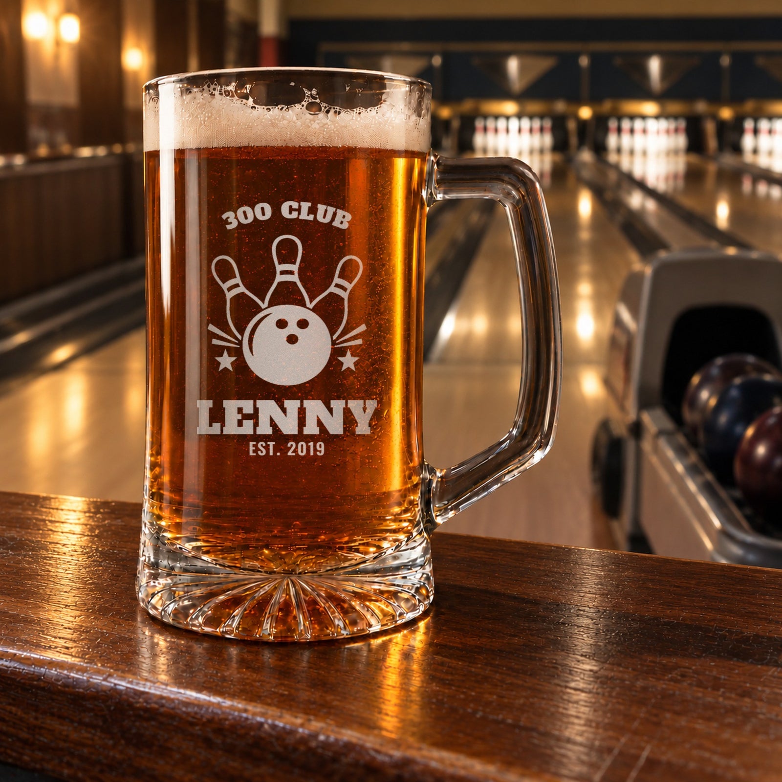 Personalized bowling beer mug in a real setting, engraved with a bowling ball and three pins: 300 Club, Lenny, Est. 2019
