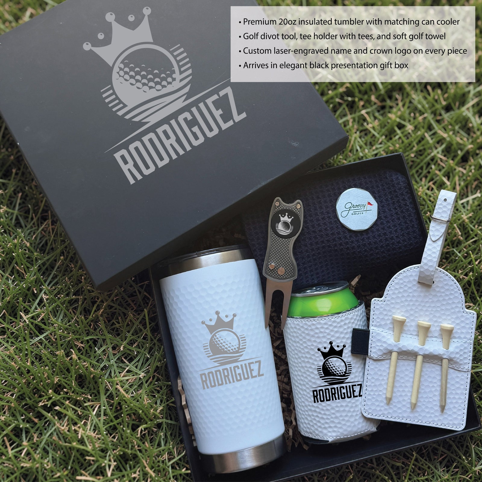 Golf set gift box open displaying laser-engraved tumbler, can cooler, divot tool, ball marker, tee holder with wooden tees, and soft towel with sample "RODRIGUEZ" personalization