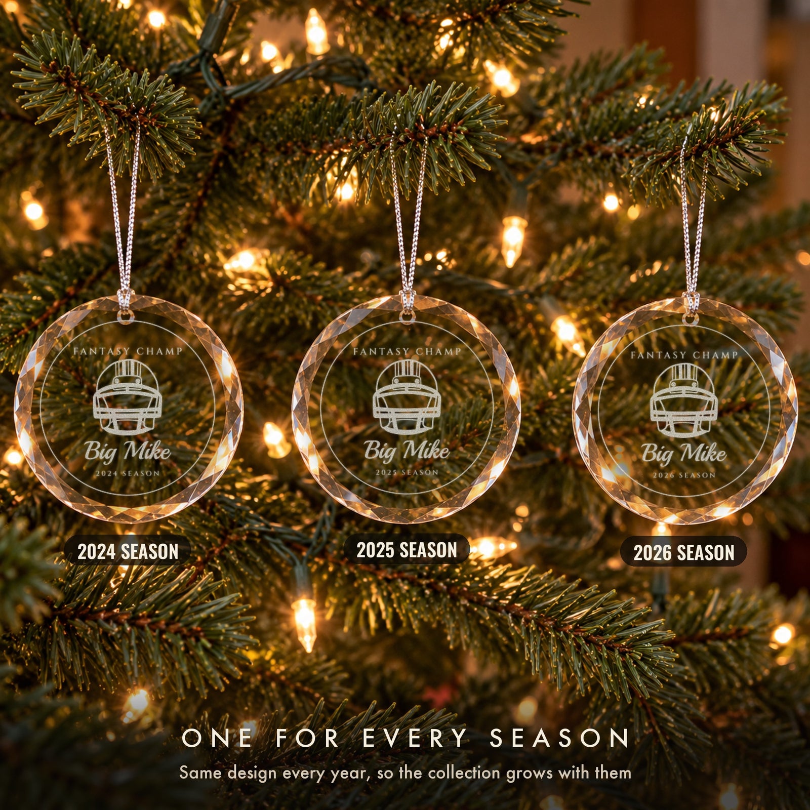 Three personalized football Christmas ornaments in a row on a tree, engraved FANTASY CHAMP, Big Mike for the 2024, 2025 and 2026 seasons, a new one every year