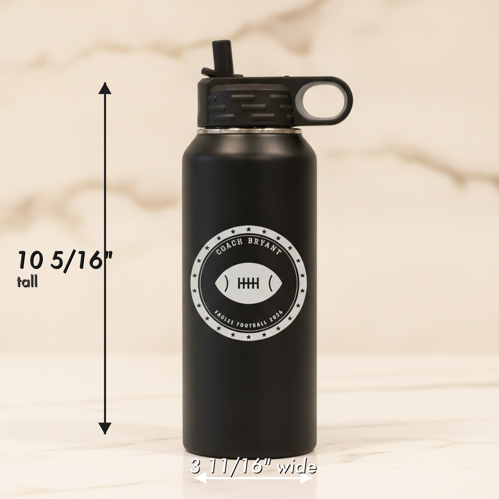 Size diagram of the personalized football coach water bottle measuring 10 5/16 inches tall and 3 11/16 inches wide with flip top lid