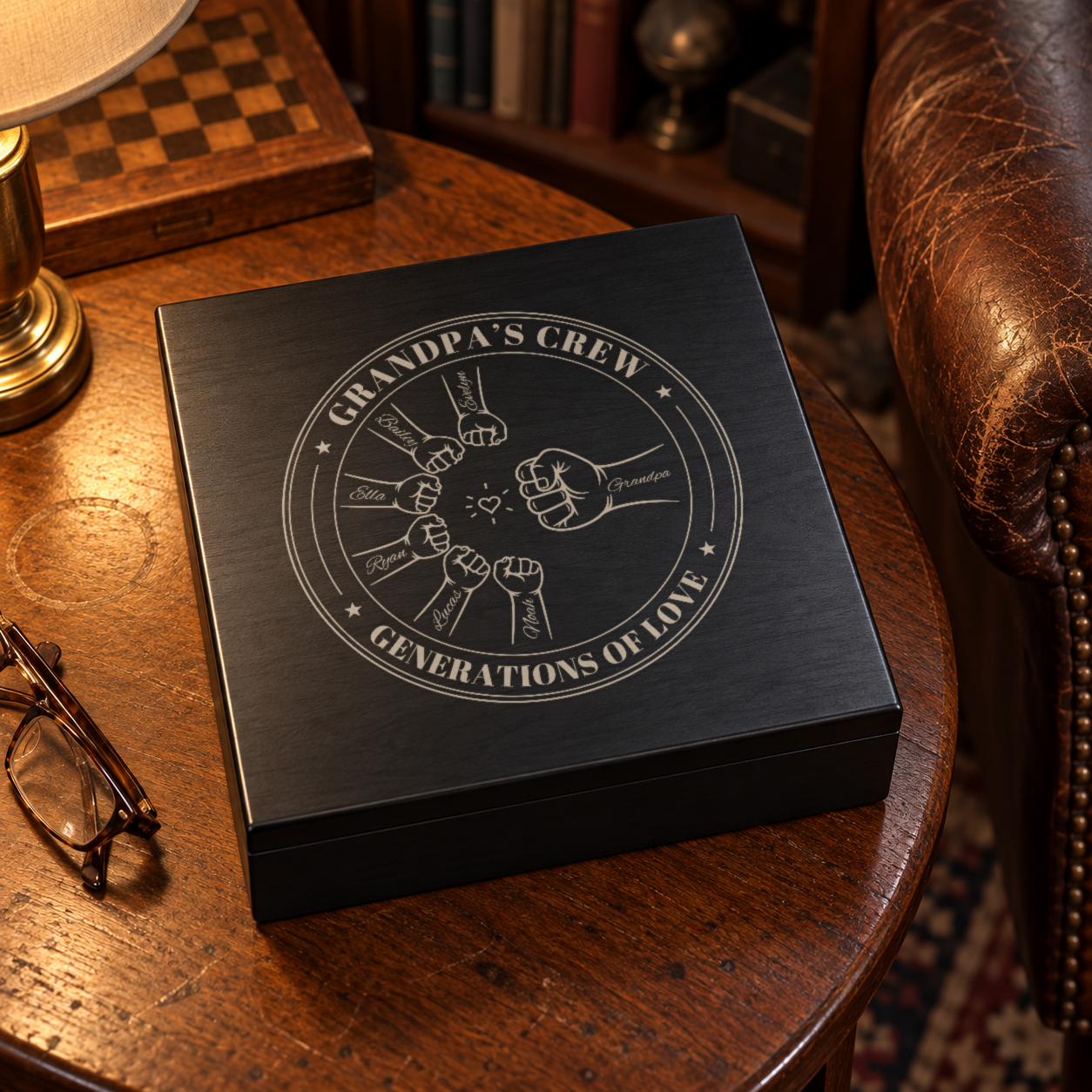 Black keepsake box in a grandpa's den, the lid engraved with a Grandpa's Crew badge of six grandkids' fists bumping Grandpa's fist