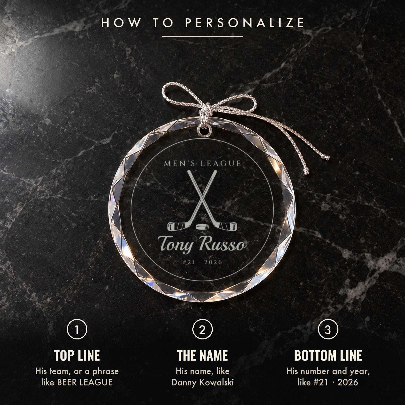 How to personalize the hockey Christmas ornament: 1 his team, 2 his name, 3 his number and year, shown on black marble engraved MEN'S LEAGUE, Tony Russo, #21 · 2026