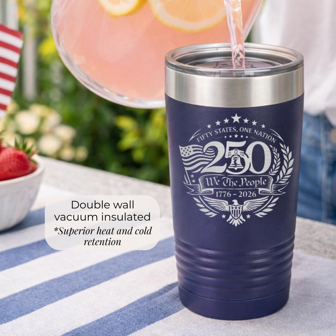 Patriotic tumbler showing American flag, Liberty Bell, and eagle artwork on stainless steel