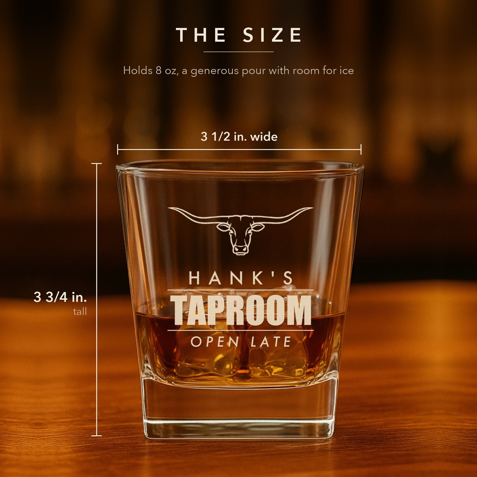 Size guide for the engraved longhorn rocks glass: holds 8 oz, stands 3 3/4 inches tall and 3 1/2 inches wide, shown with Hank's Taproom