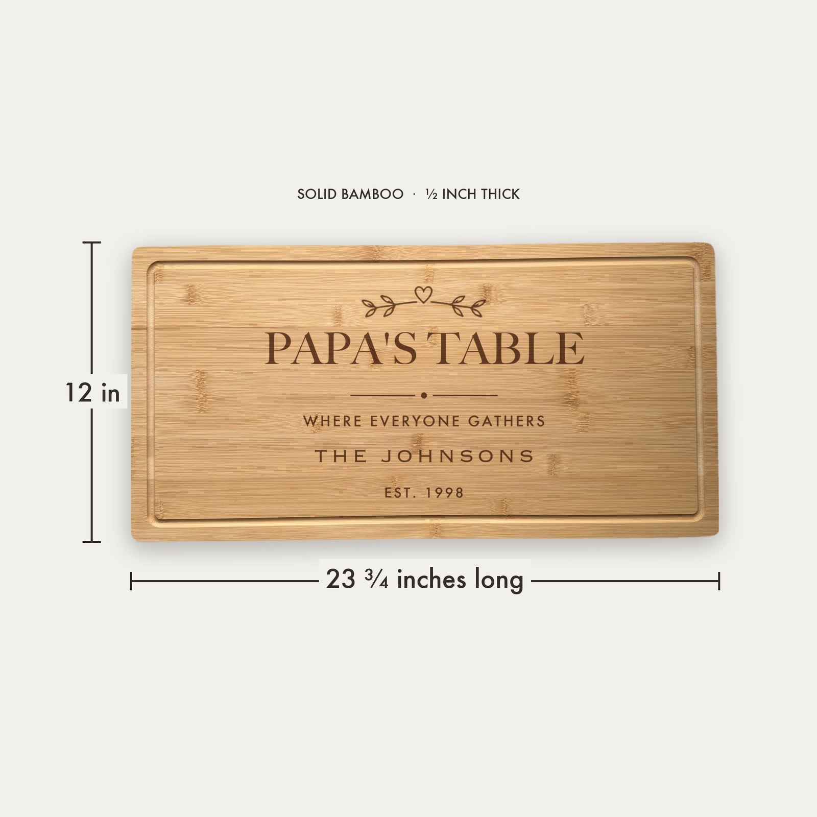 Size guide for the personalized grandpa cutting board, 23 and three quarter inches long by 12 inches wide in half inch thick solid bamboo.