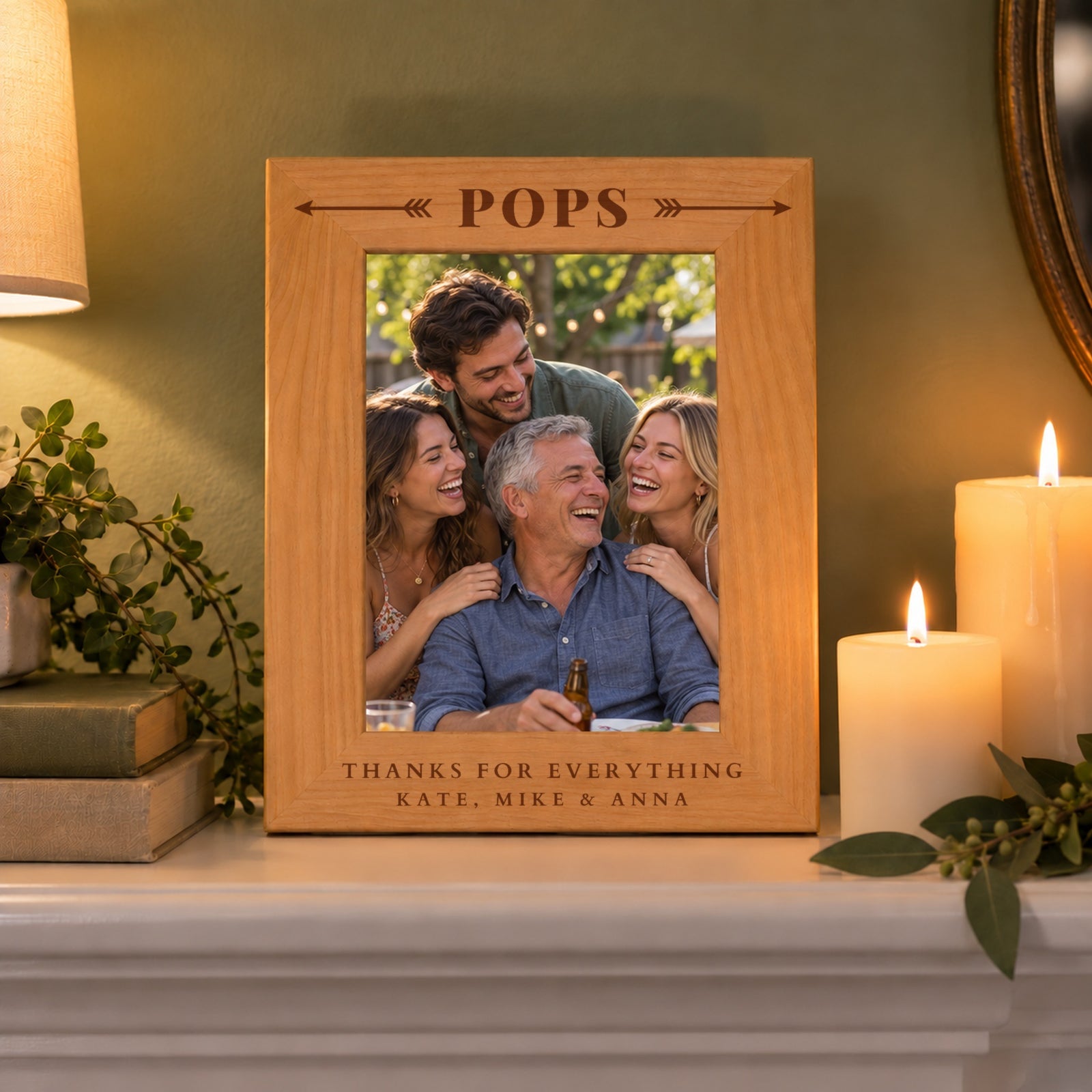 Dad picture frame engraved Pops with Thanks for Everything and Kate, Mike & Anna on a mantel, holding a photo of a dad with his three grown children