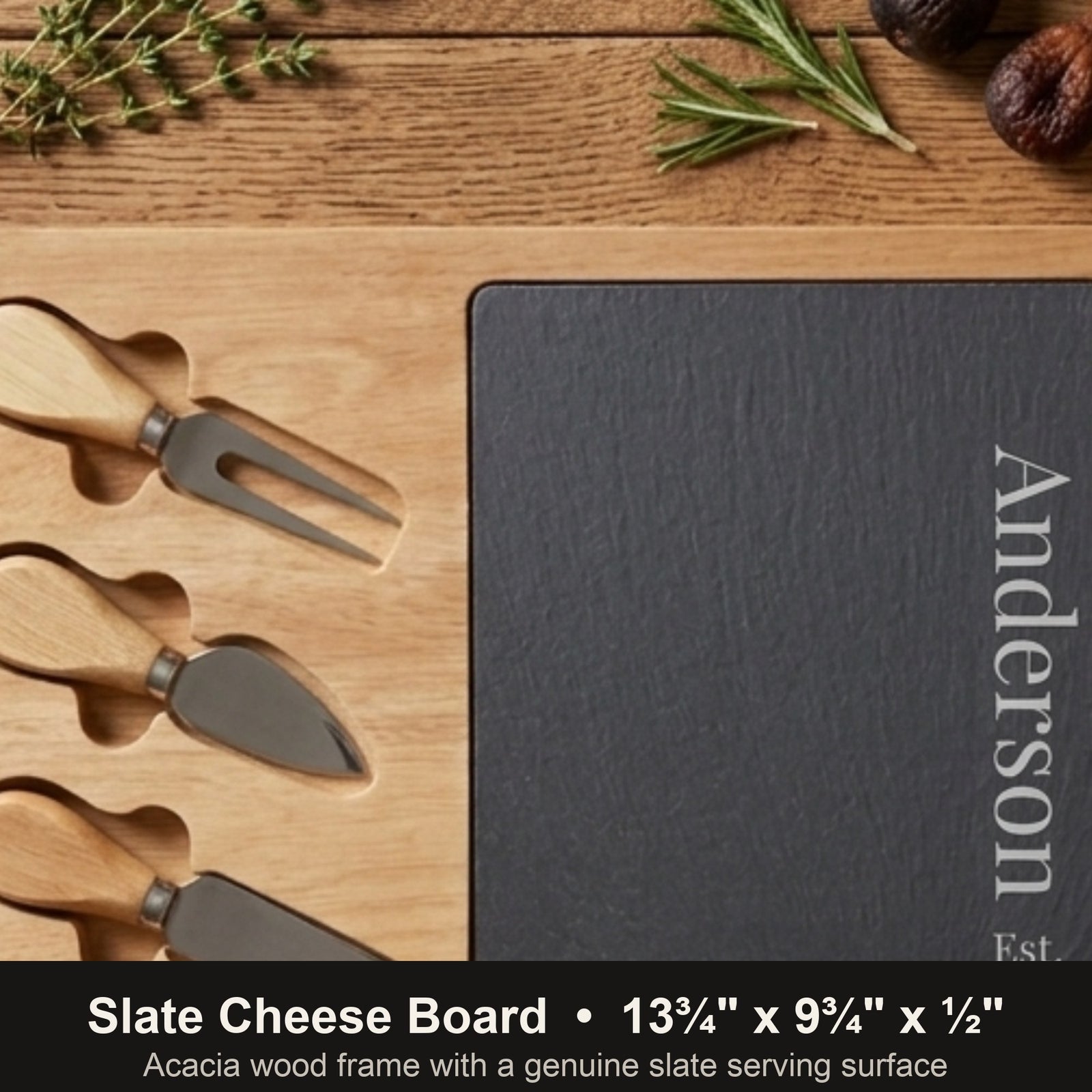 Close-up of the personalized slate cheese board engraved Anderson Est. 2015 with dimensions 13 3/4 by 9 3/4 by 1/2 inches and three wood-handled cheese tools