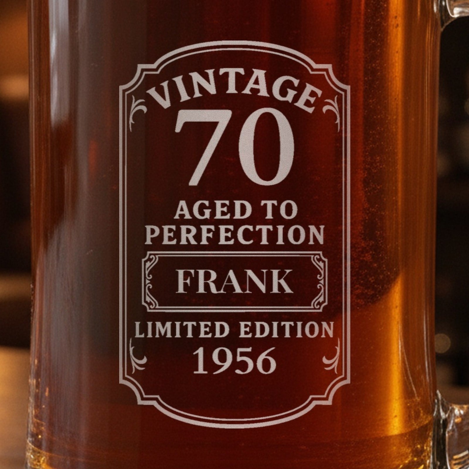 Close-up of the frosted laser engraving on the 70th birthday beer stein: Vintage 70, Aged to Perfection, Frank, Limited Edition 1956