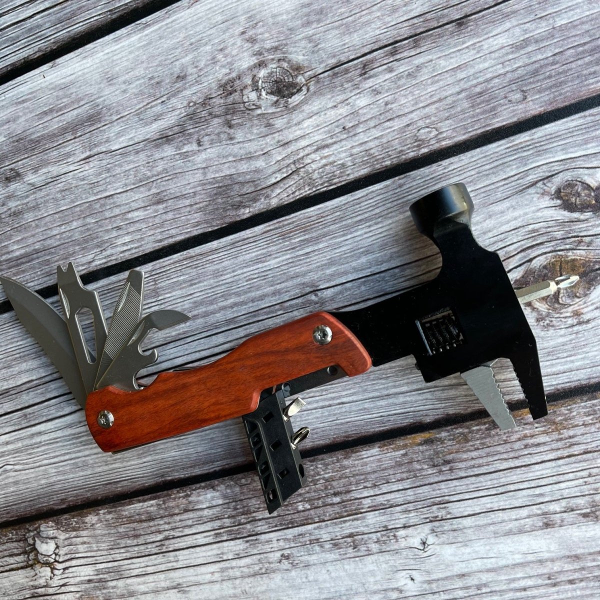 Multi tool without engraving against wood background
