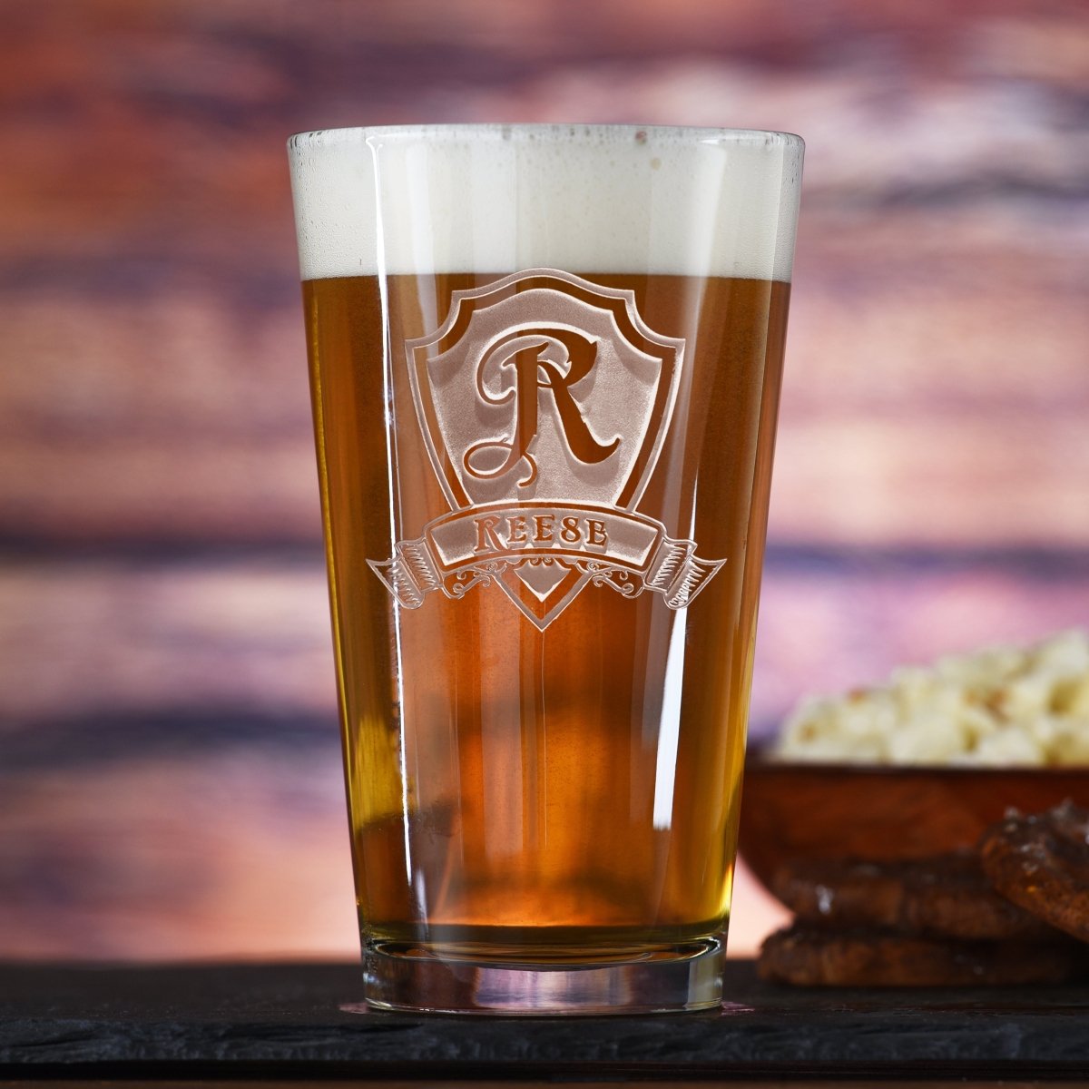 Monogram Shield personalized pint glass with sand-carved family crest