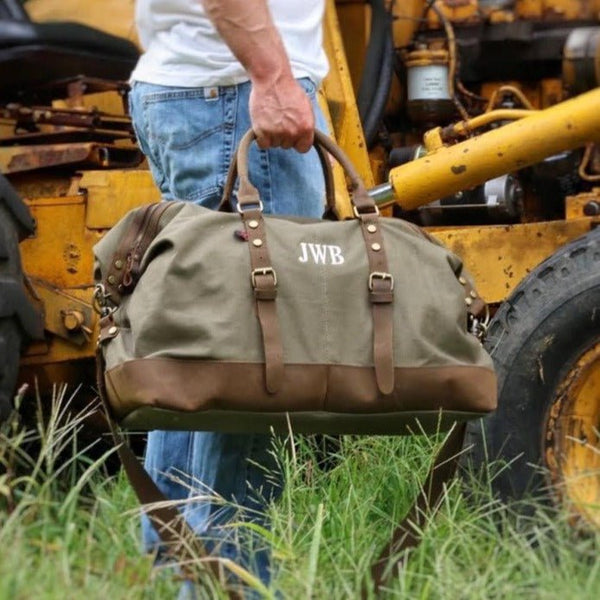 Personalized canvas weekend bag with leather handles and custom initials