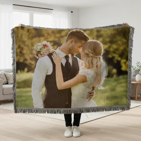 Romantic personalized Christmas gifts for him including an engraved photo keepsake, a custom decanter and a woven couple photo blanket