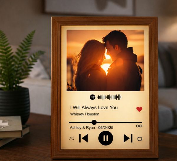Personalized song light box with a couple's sunset photo and their song, one of 39 meaningful gifts that say I love you to him