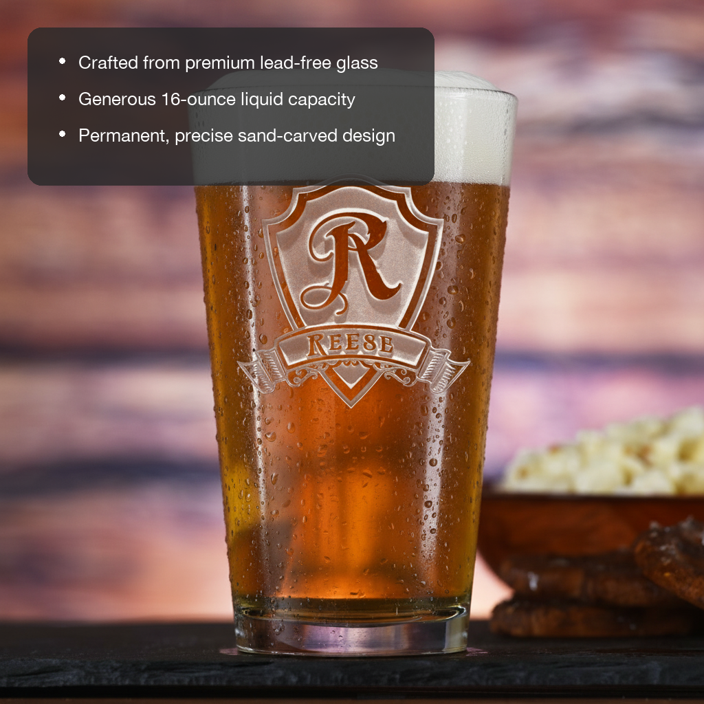 Monogram Shield Personalized Pint Glass features showing premium lead-free glass, 16 oz capacity, and permanent sand-carved design