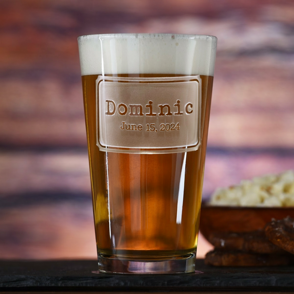 Close-up macro of Square Label Personalized Pint Glass showing the sand-carved 3D depth of the square label design with groomsman name and wedding date