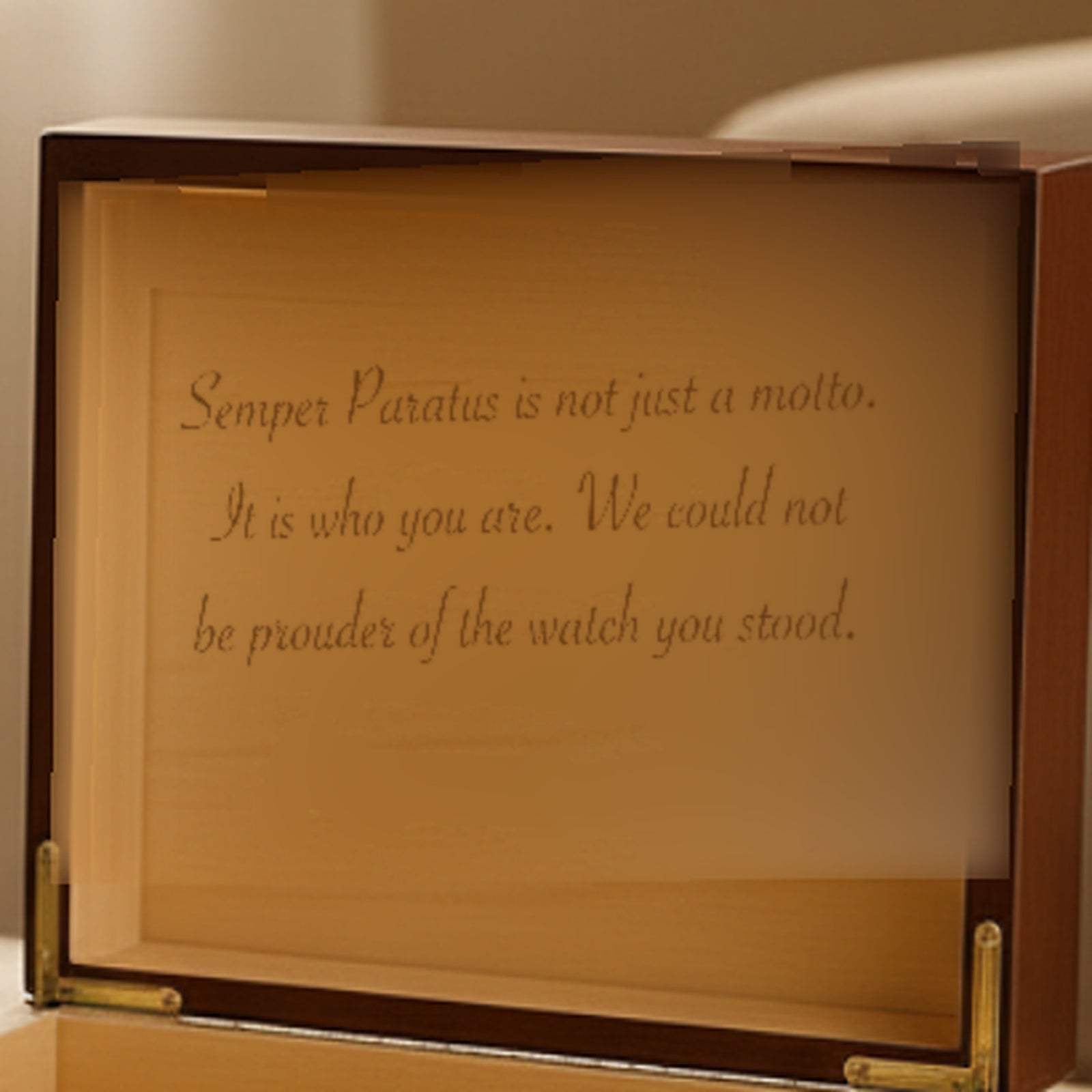 Spanish cedar inside lid of the Coast Guard keepsake box engraved with a personal three line message in script lettering.