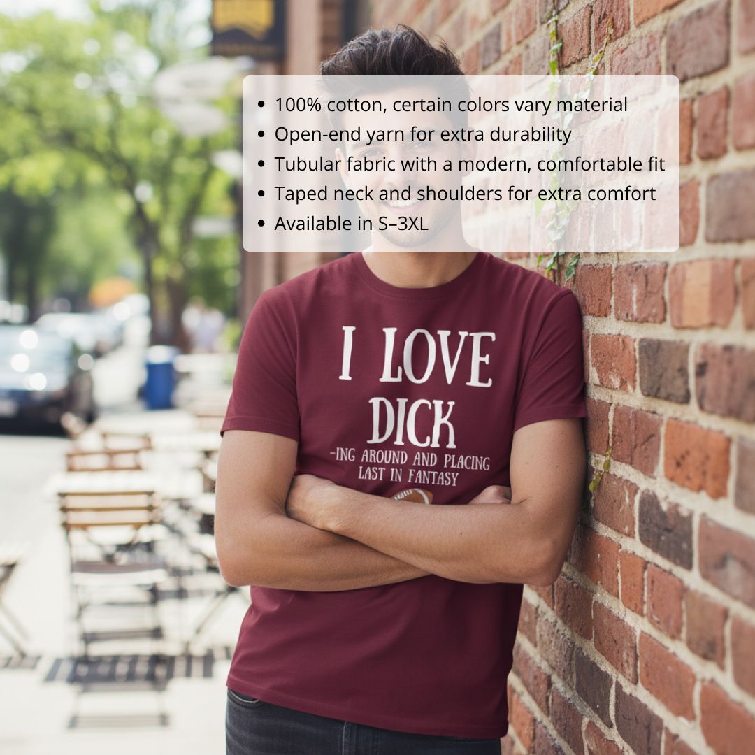 Maroon t-shirt with white text reading "I LOVE DICKING AROUND AND PLACING LAST IN FANTASY," worn by model against brick wall backdrop