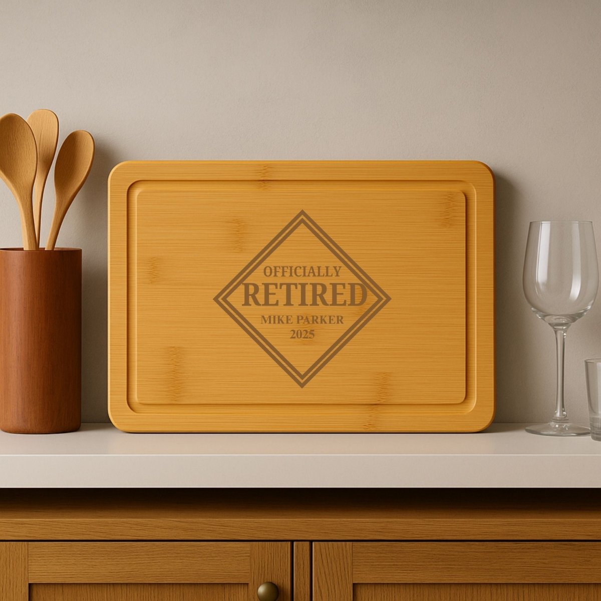 Personalized bamboo cutting board with "Officially Retired" engraving, custom name and year – retirement gift for men