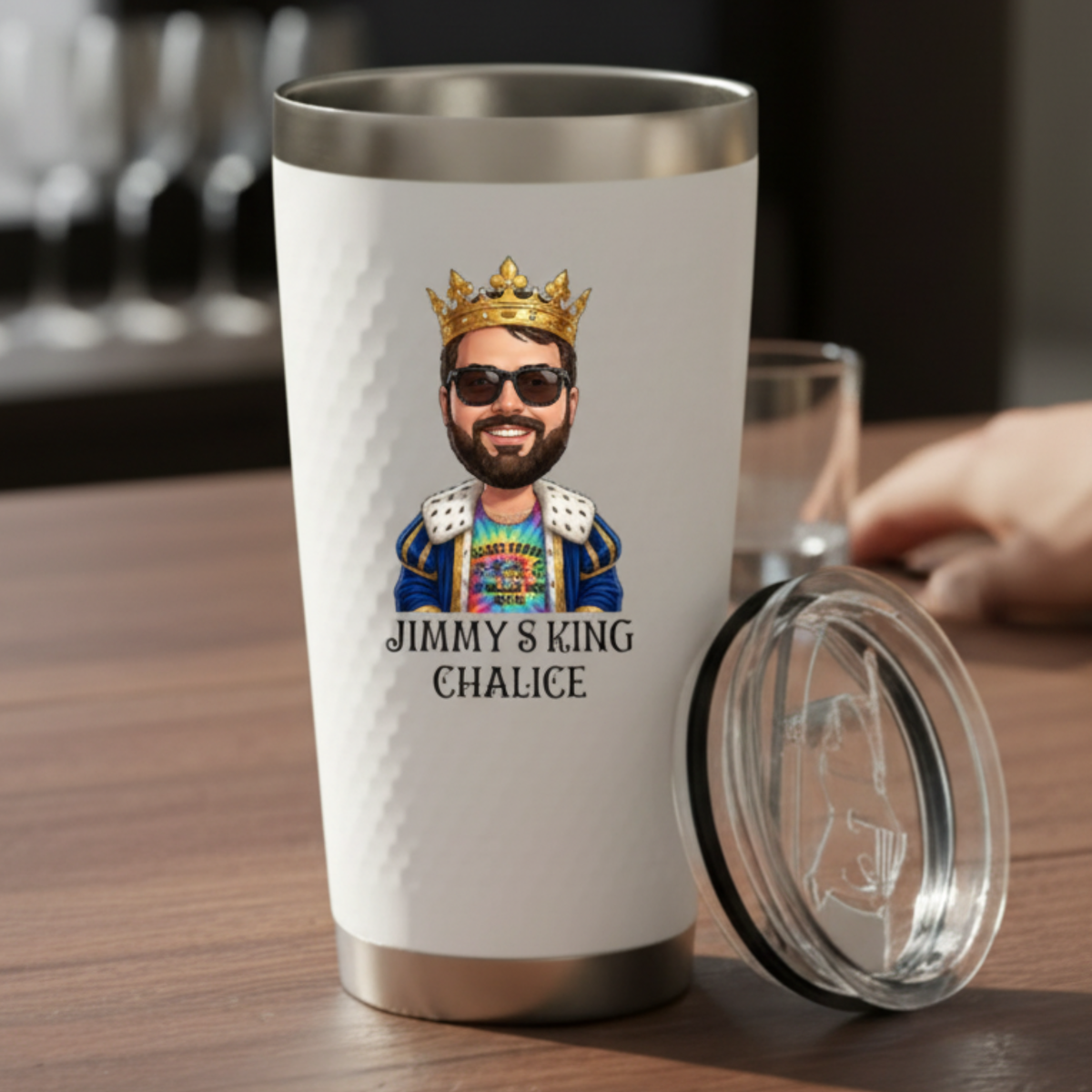 White stainless steel tumbler with lid featuring custom cartoon illustration of bearded man wearing crown, sunglasses, and royal robe, labeled "Jimmy's King Chalice